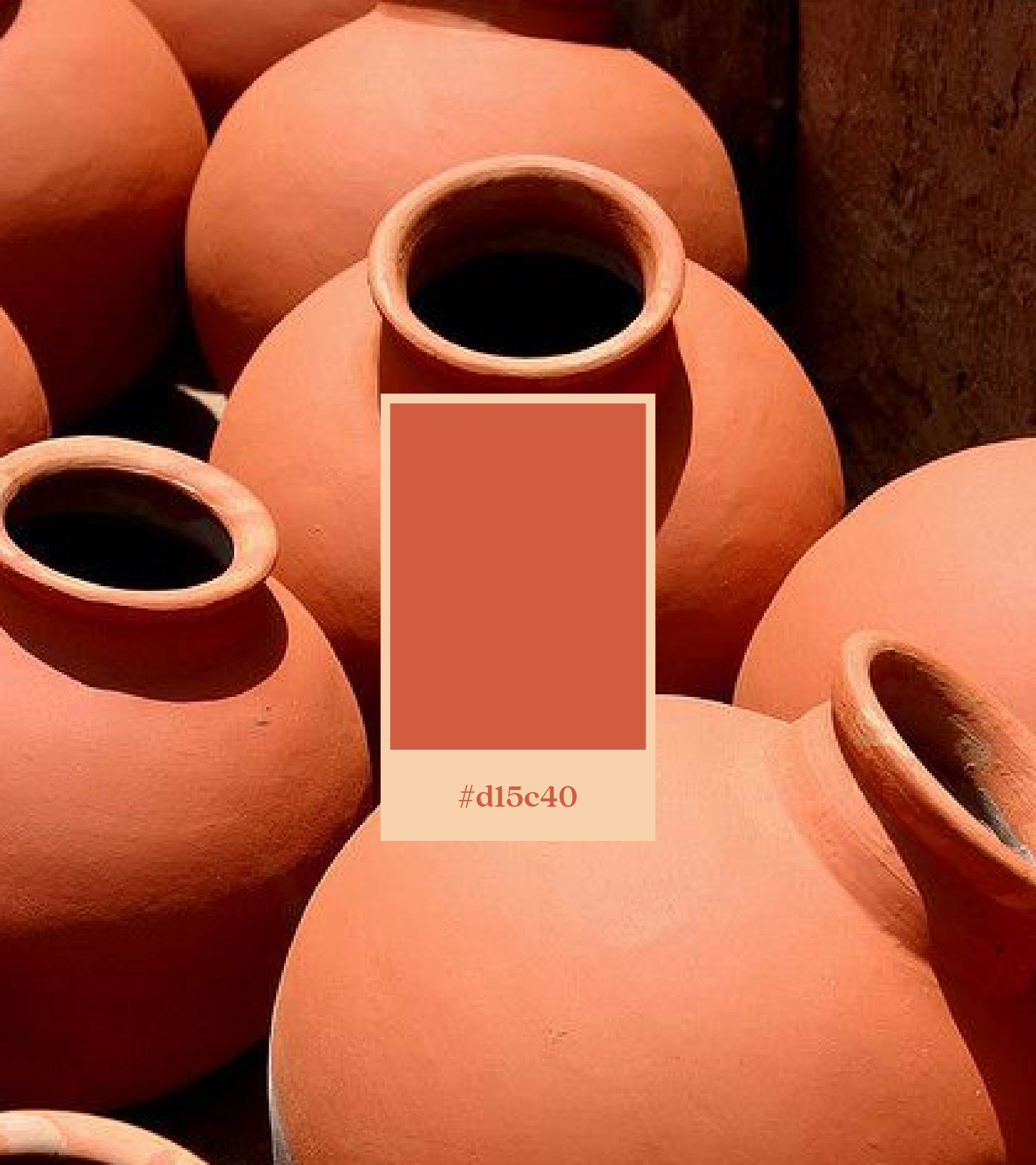 Terracotta clay pots with the brand colour swatch #d15c40